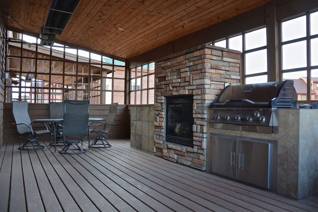 This home located just minutes from Winter Park has an outdoor covered patio with a fireplace and BBQ Grill.