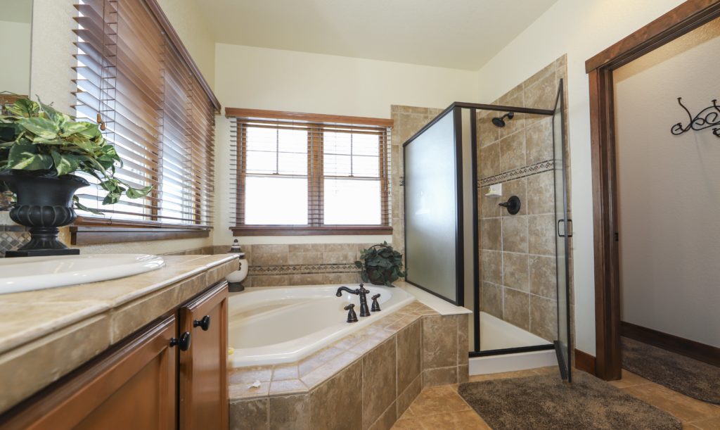 Master bath with soaking tub, dual sinks and walk in shower